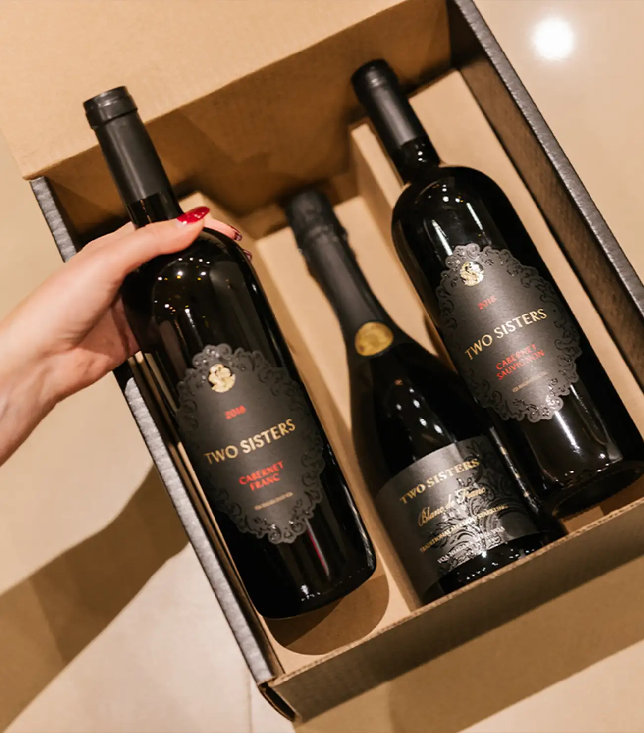 Two Sisters Vineyards wooden gift box of wines.